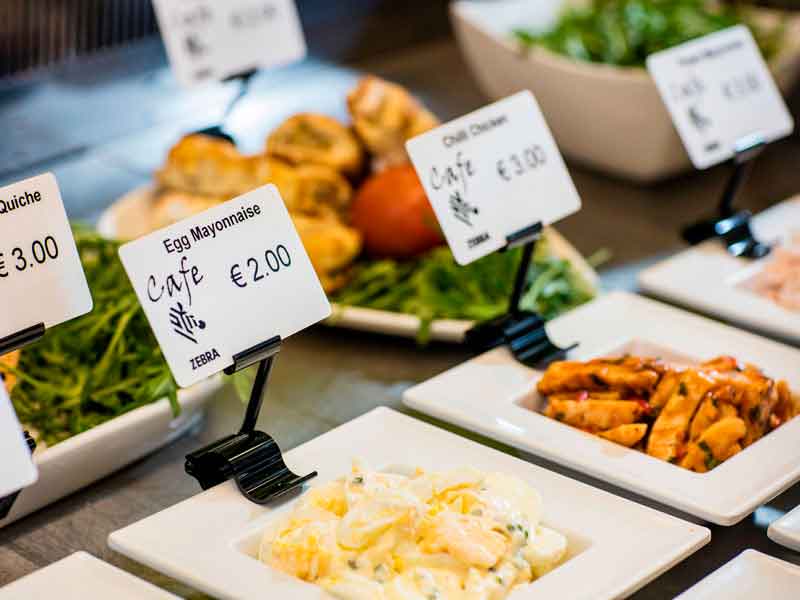Food safe label cards on a buffet line